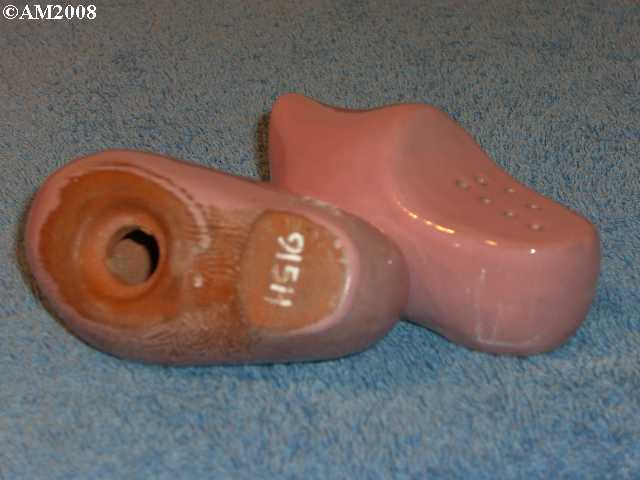 Dutch shoe shakers glazed terra cotta rose